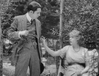 The "losing" suitor (Walter Miller) and Blanche Sweet, "Death's Marathon" (1913).