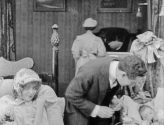 Blanche Sweet and H. B. Walthall: The new family, now with baby . . .