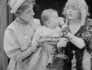 Desperate for a way to occupy her husband until the partner can reach him to stop the suicide, the wife puts their child next to the receiver, hoping against hope to distract or dissuade him from the deed.